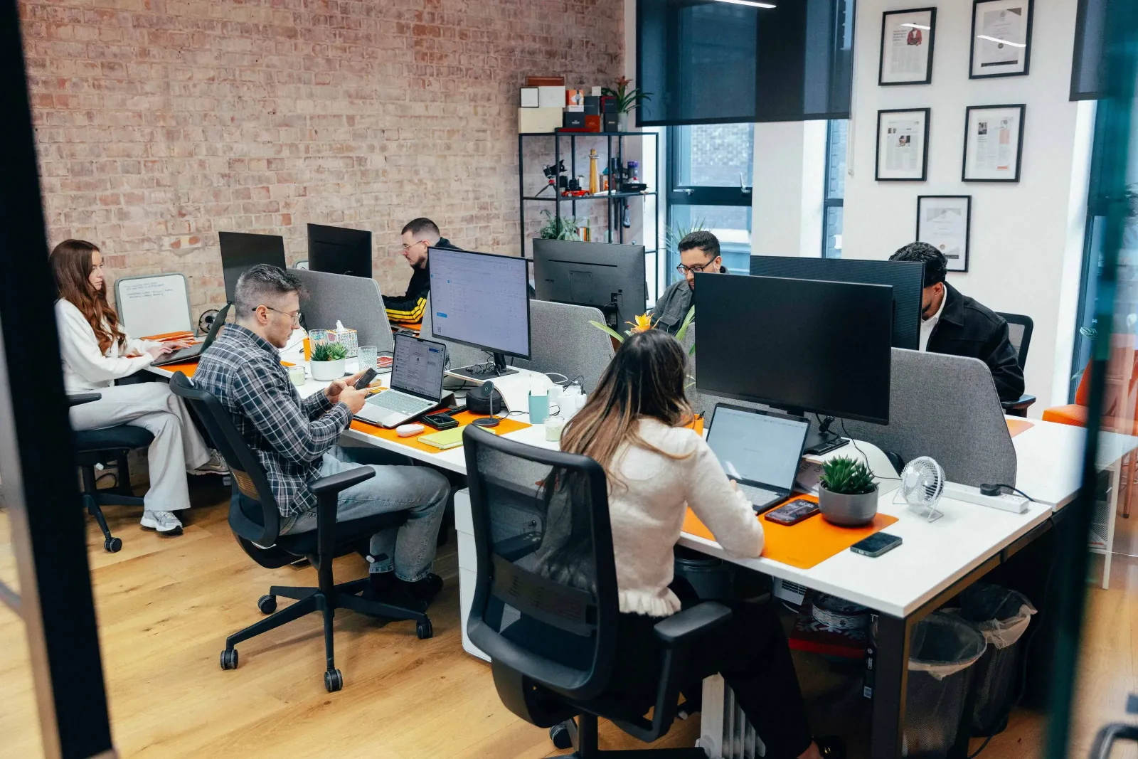 VARTEQ team members collaborating in the office